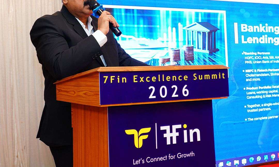 A 7Fin leader addressing the team from the podium at the Excellence Summit 2026